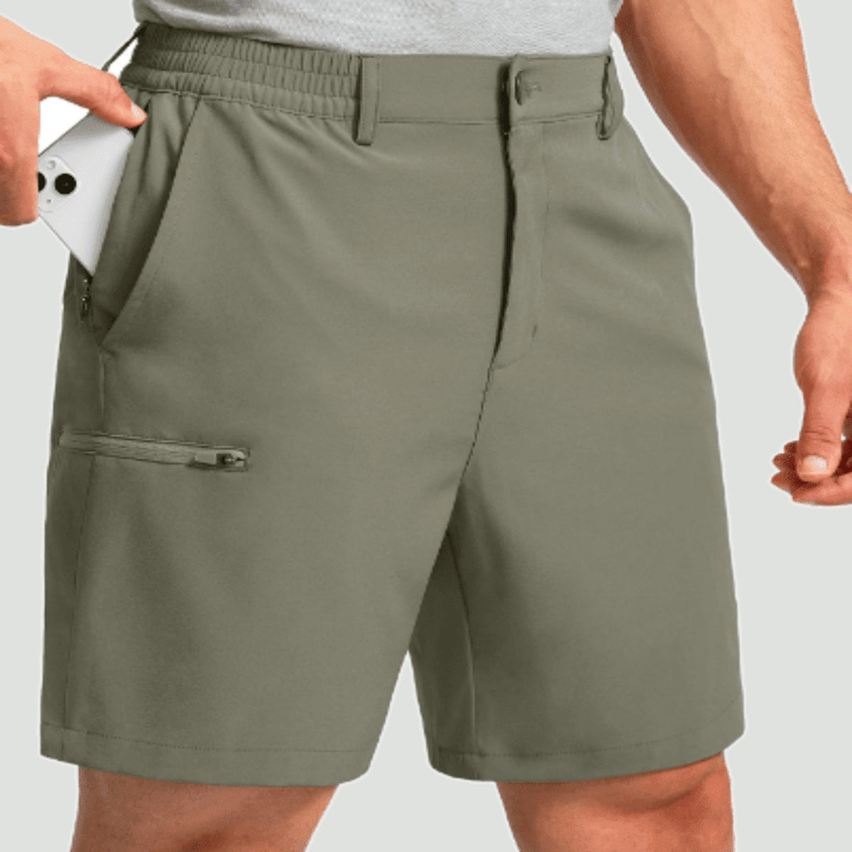 Quick dry stretch shorts in Olive Green, front view on a man