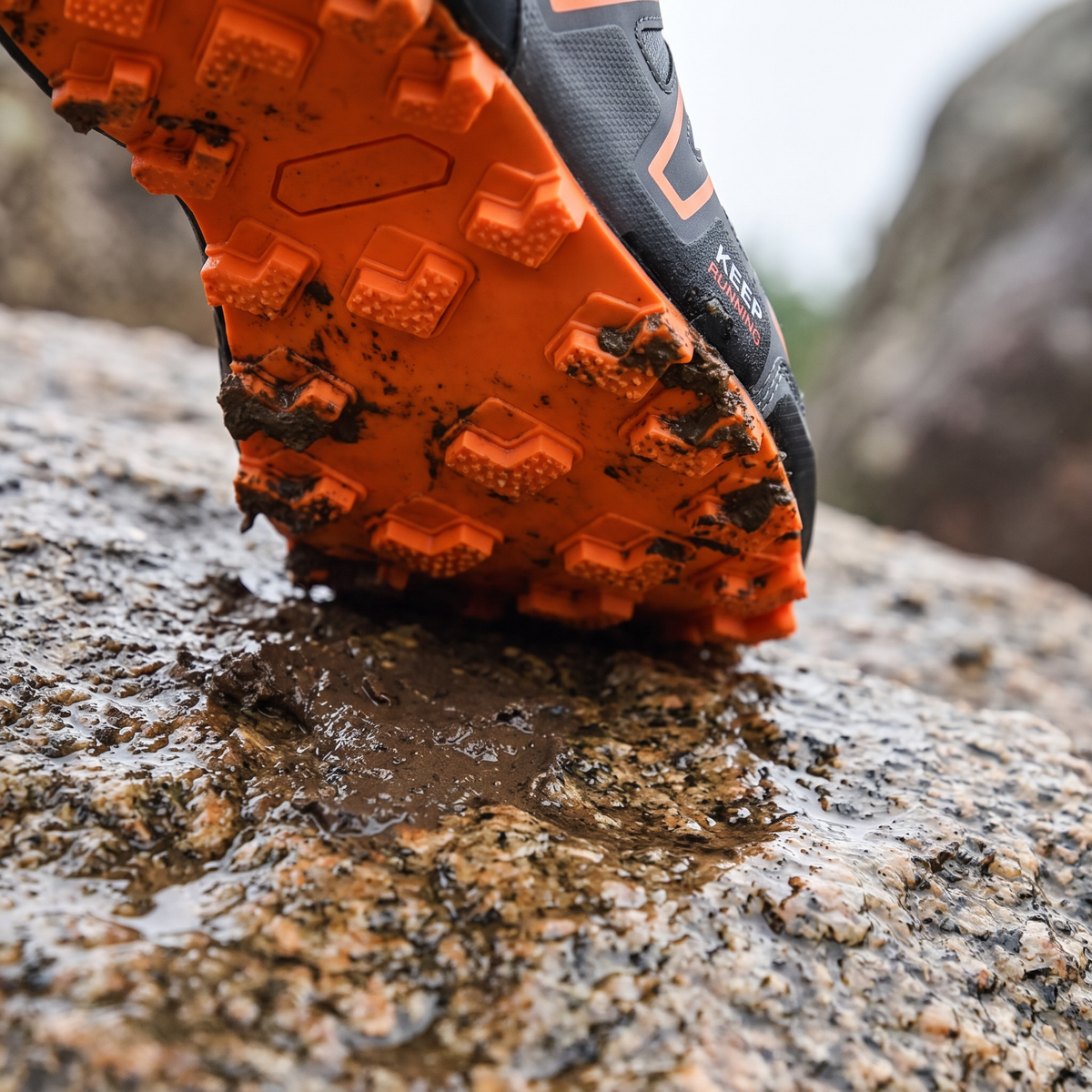 Multi-directional lugged rubber outsole on trail running shoes