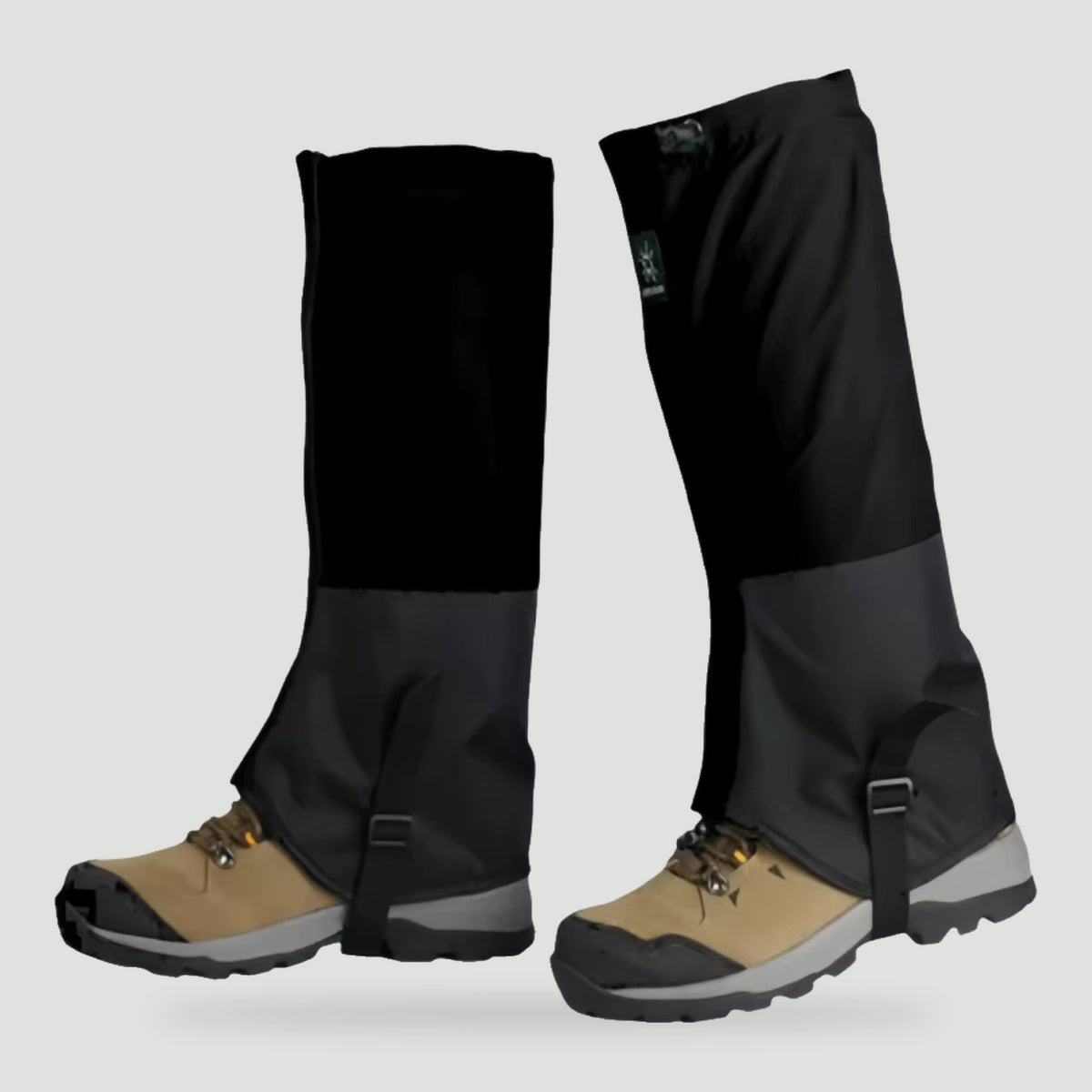 Hiking gaiters in Black, fitted over hiking boots