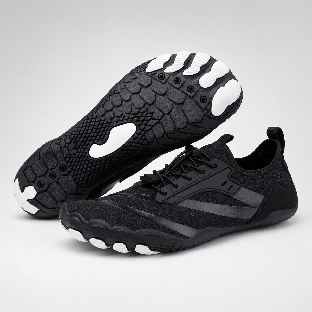 Black barefoot shoes with a thin grippy outsole