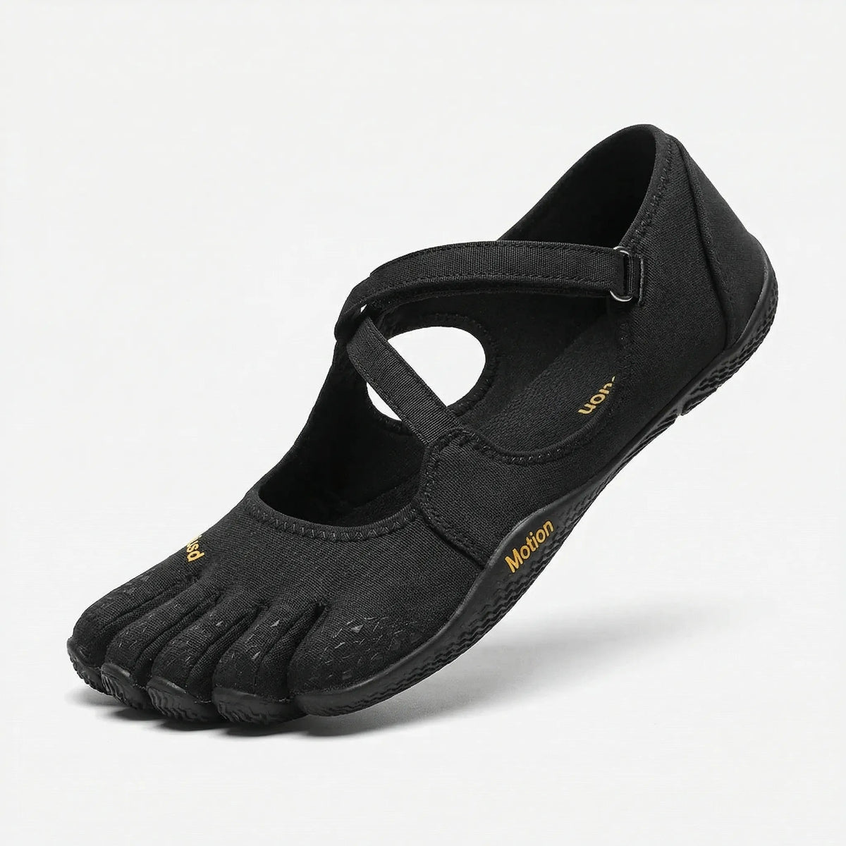 Women's five toe shoes in Black, side view with the crossing strap