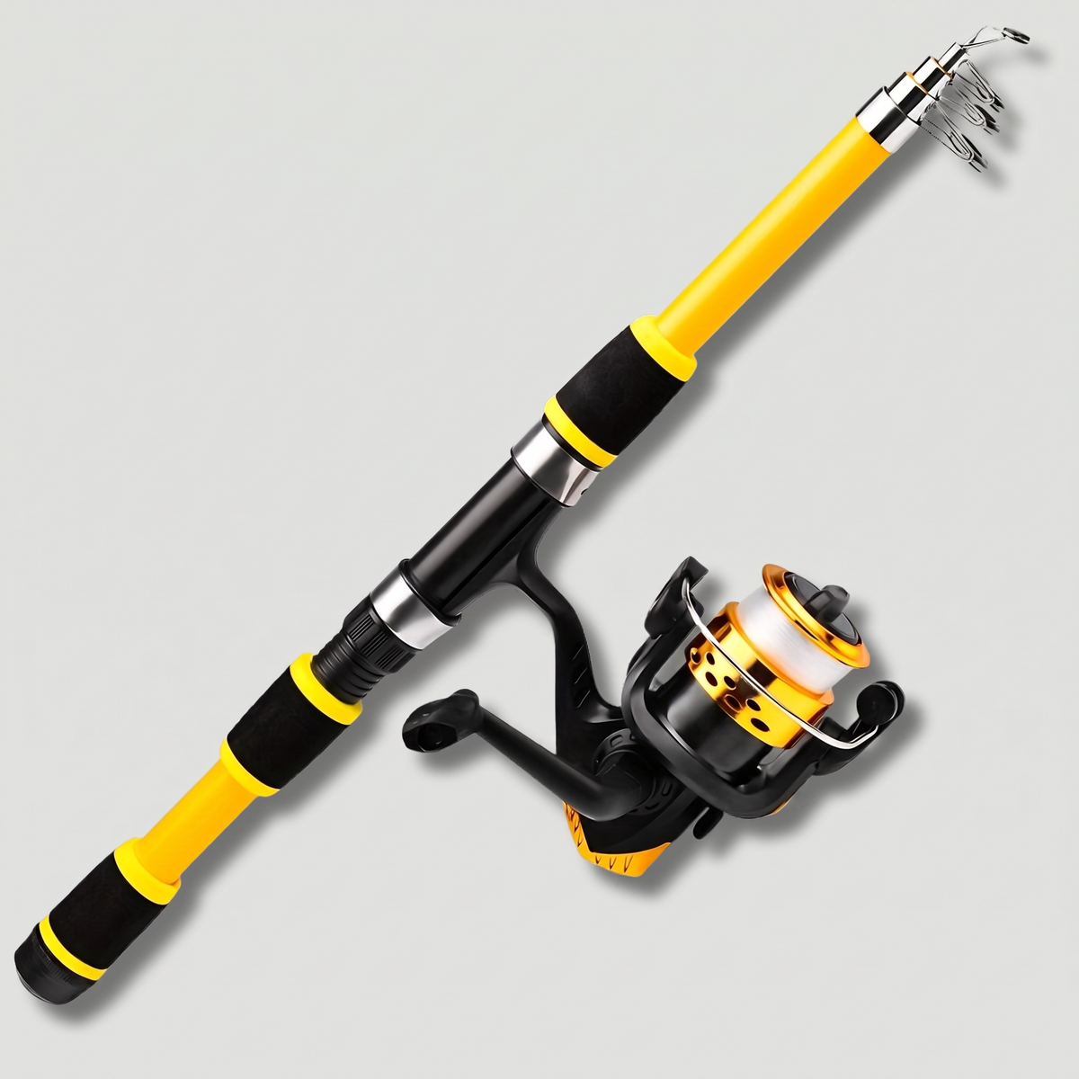 Telescopic fishing rod and reel combo in yellow, extended