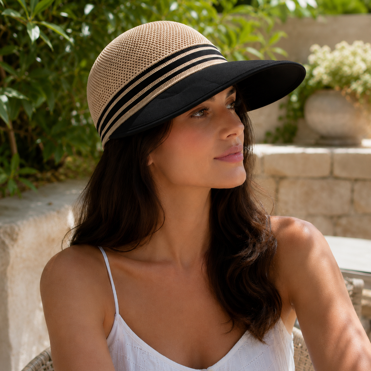 Woman wearing the women's sun hat in Khaki outdoors