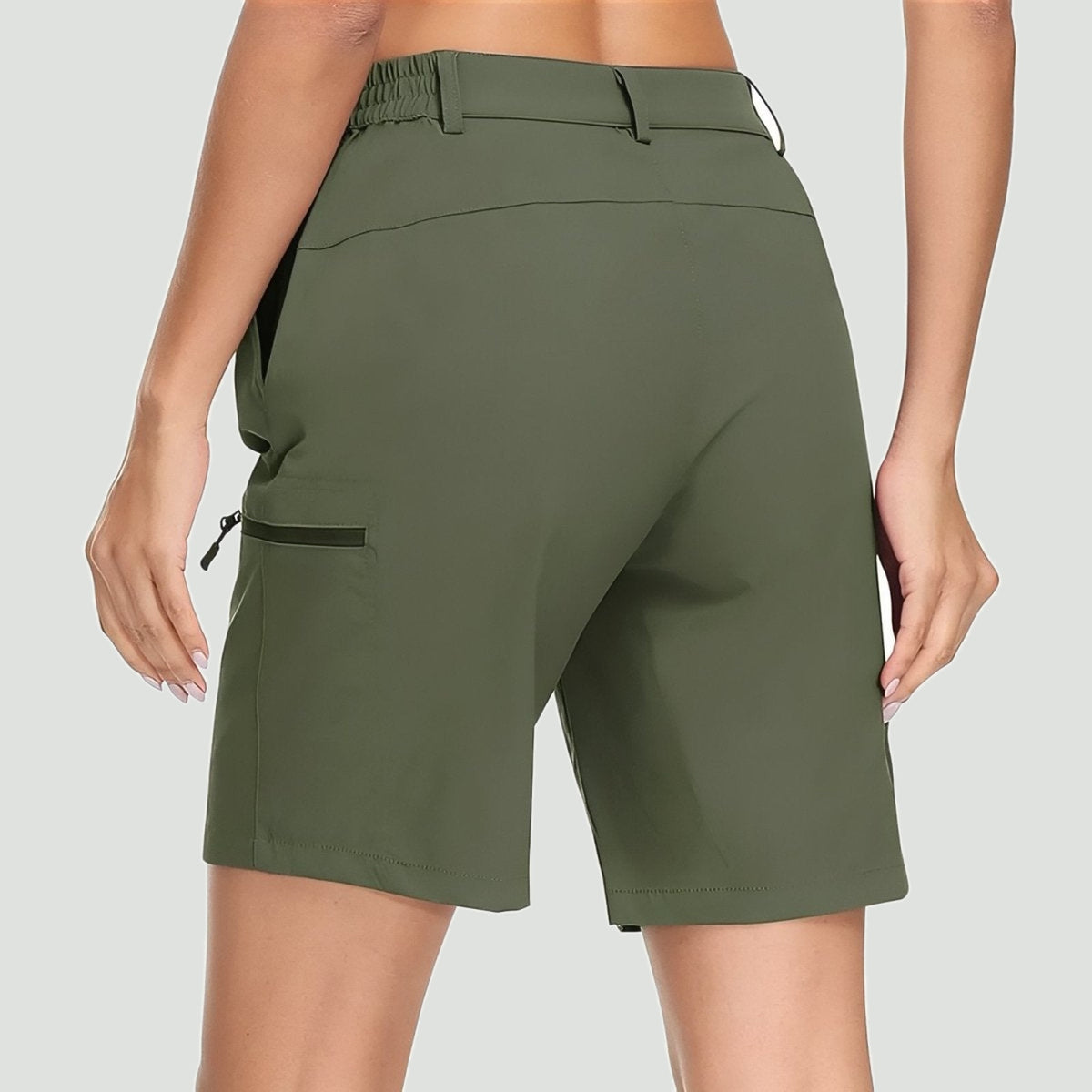 Woman wearing the quick dry stretch shorts, back view with zip thigh pocket