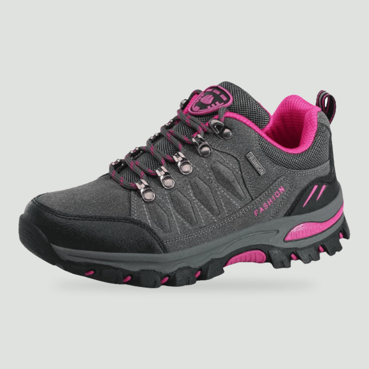 Women's hiking shoe in Grey with pink trim, side view