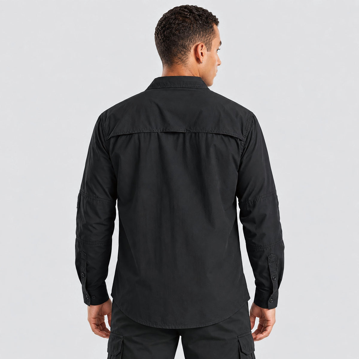 Men's hiking shirt in Black, back view with vented back panel