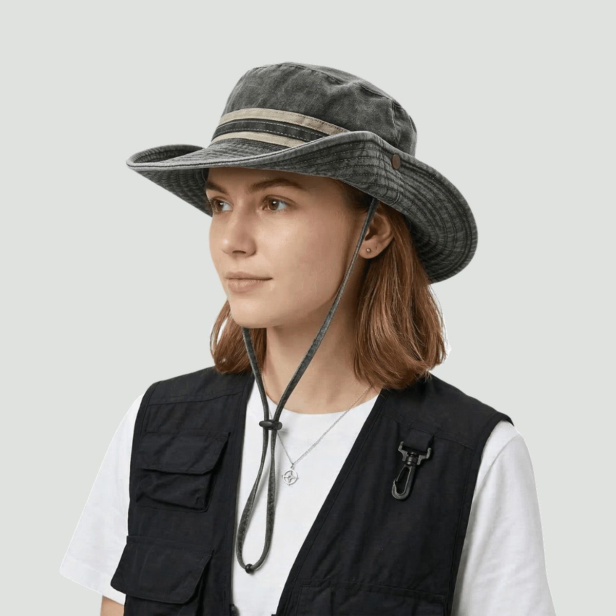 Woman wearing the packable safari hat in Black