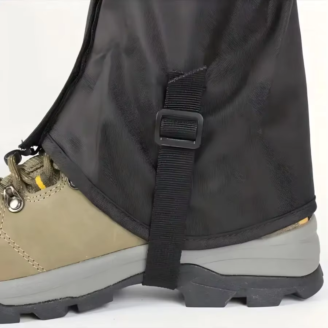 Hiking gaiter boot strap and buckle under a hiking boot