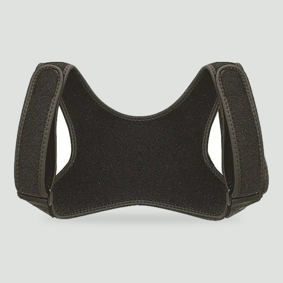 Back and shoulder brace in Black, laid flat