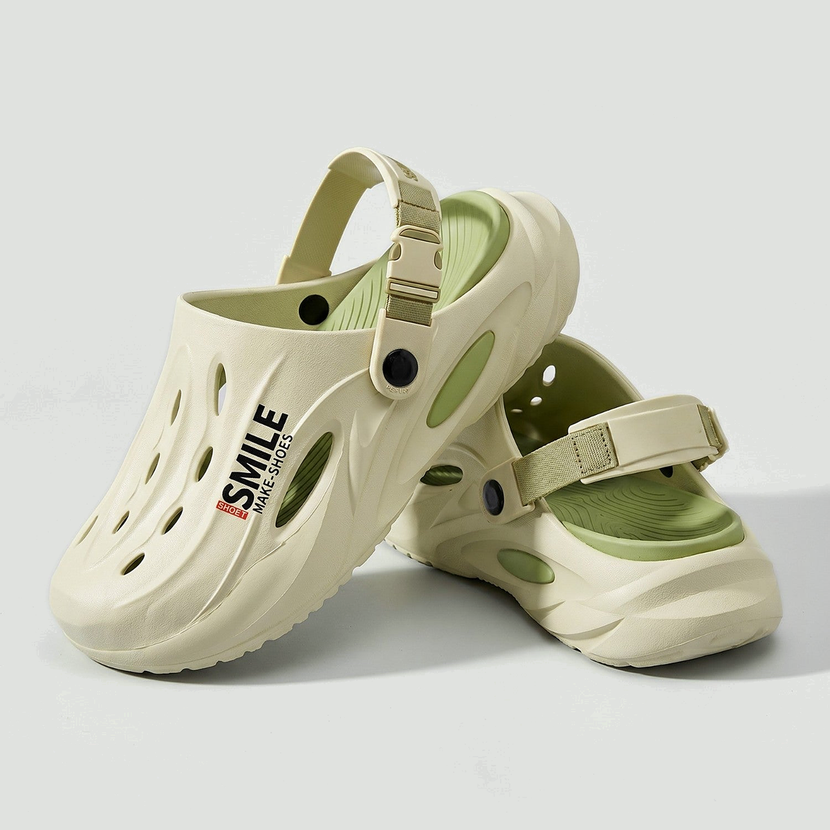 Men's EVA clogs in Mint Green, pair on a light grey studio background