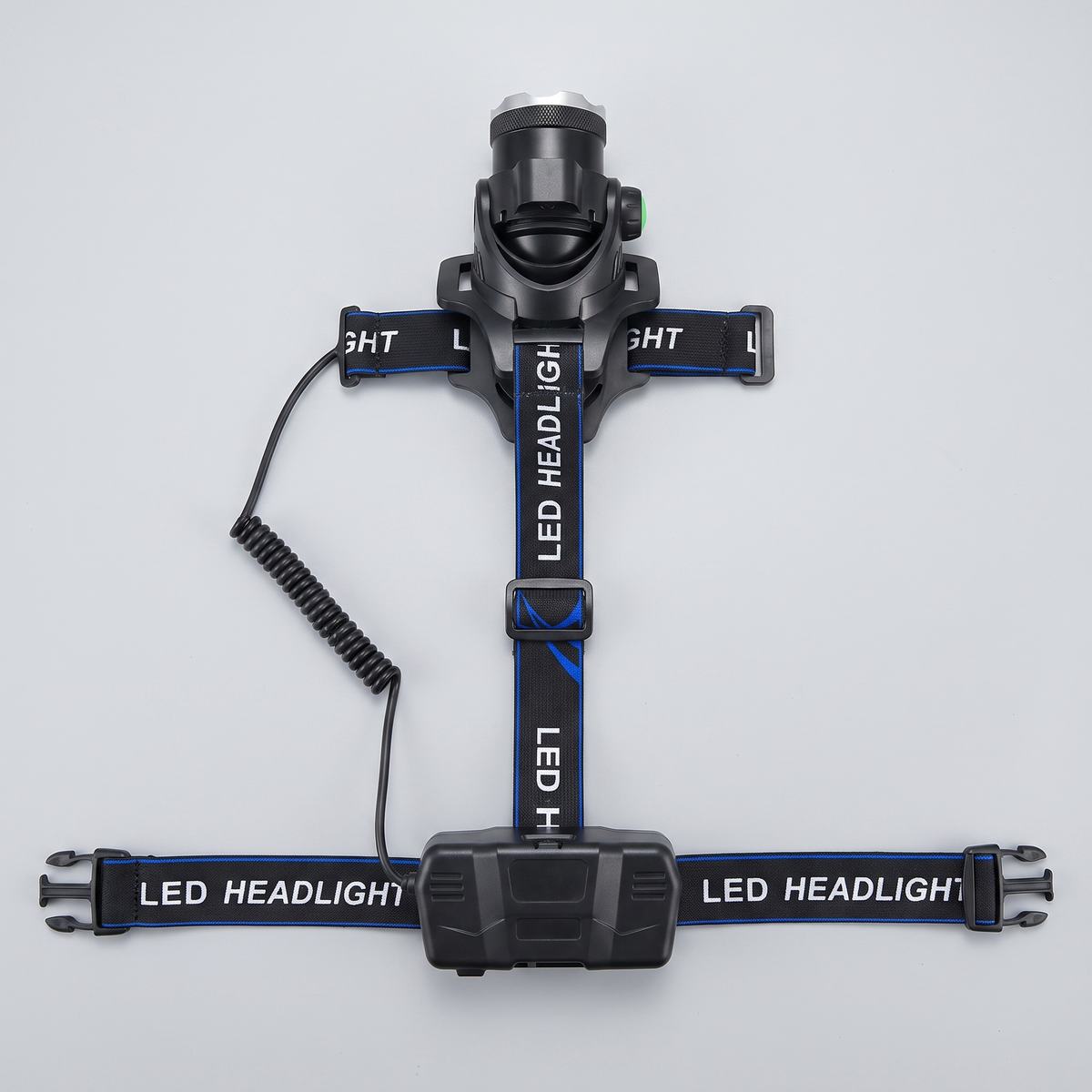 Head torch with the three-point harness opened out flat