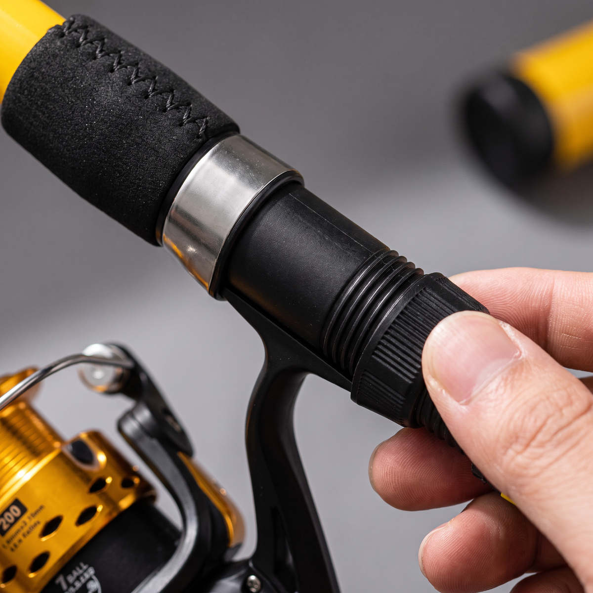 Close-up of the screw-down reel seat being tightened